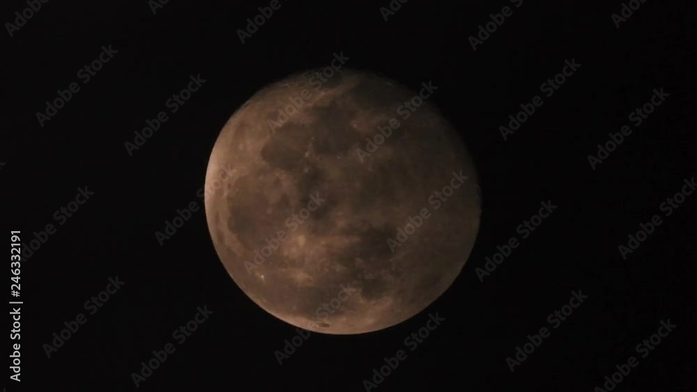 Extreme zoom photo of moon at night with deep dark clouds and strong wind Extreme zoom photo of moon at night with deep dark clouds and strong wind