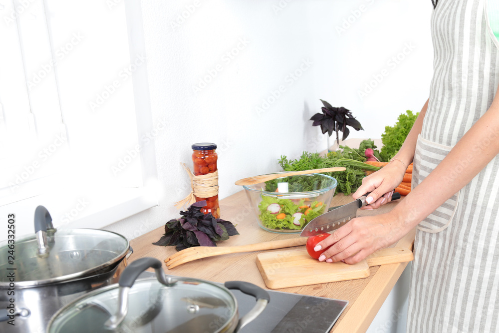 Fresh vegetables on the cutting board, salad in a glass dish. Concept of cooking Fresh vegetables on the cutting board, salad in a glass dish. Concept of cooking