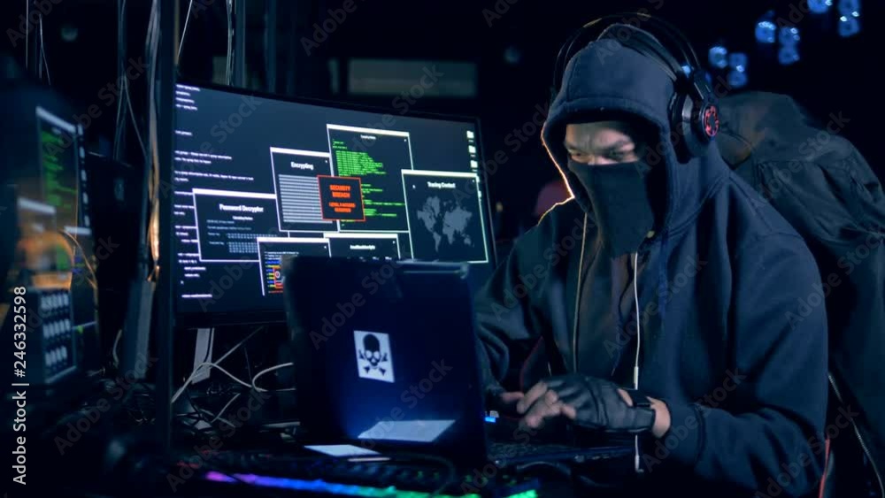 Male hacker working with hacking equipment, close up. Male hacker working with hacking equipment, close up.