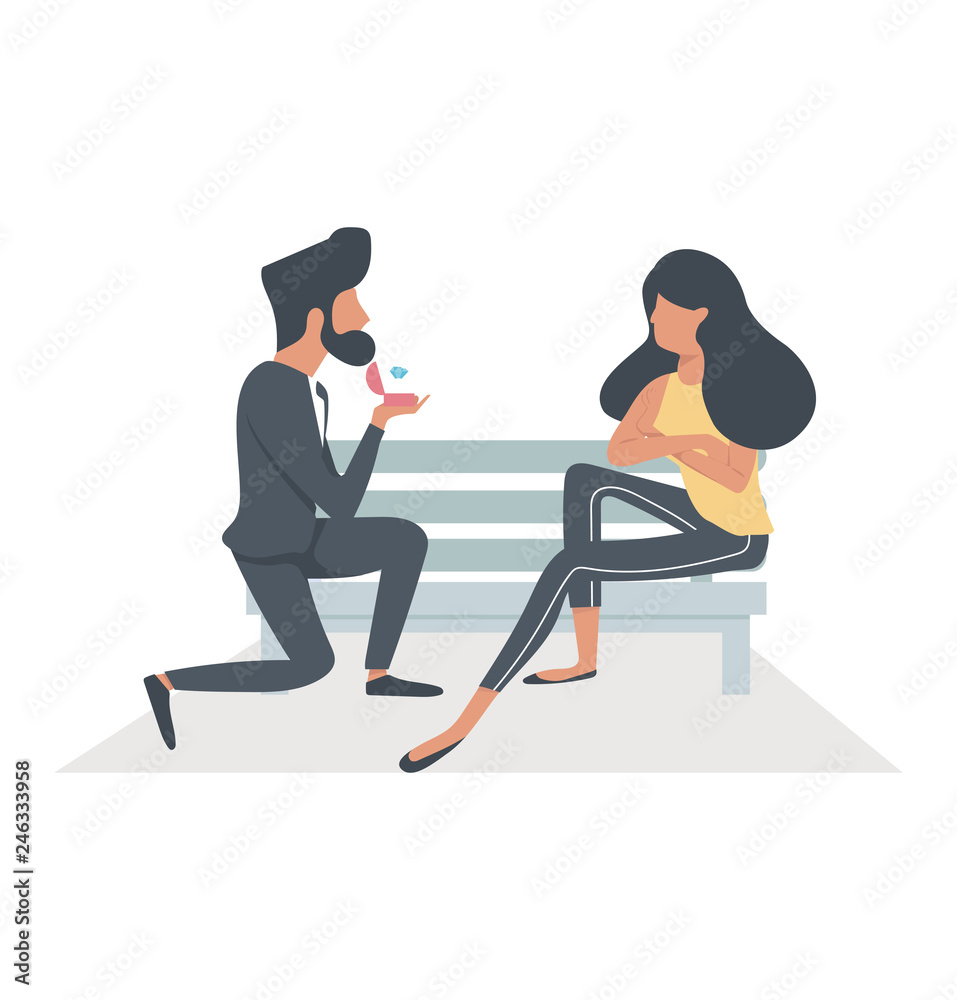 A Man proposing  a woman sitting bench