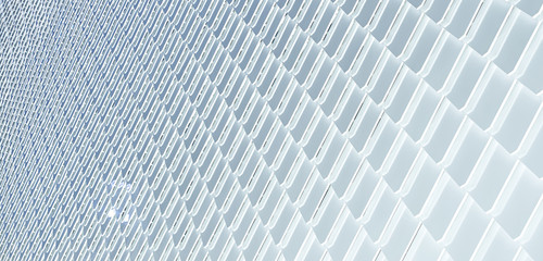 Close up of abstract geometric structure white wall .