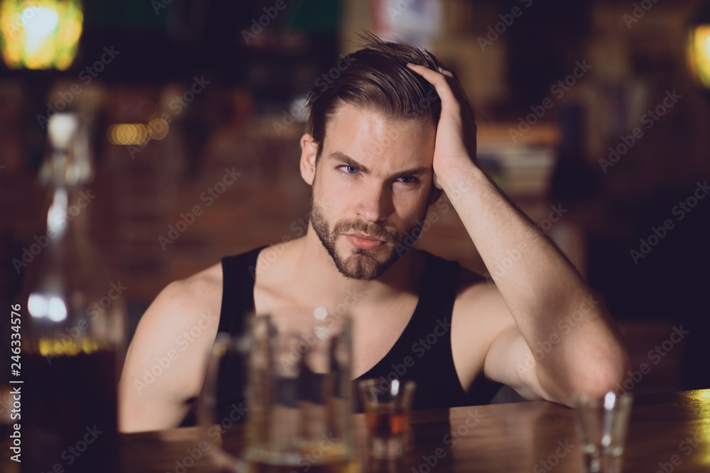 Dependence or addiction. Alcoholic man drinking at bar counter. Drinking alcohol. Man drink strong alcoholic beverage and beer in pub. Alcohol addict with short alcohol drink. Alcohol addiction
