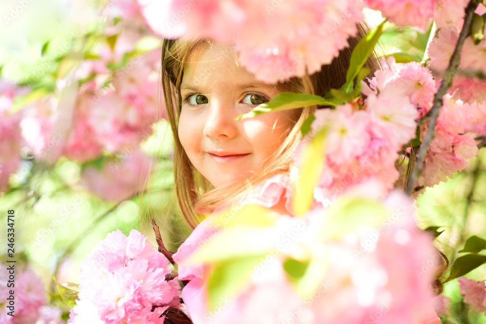 Fototapeta premium Small child. Natural beauty. Childrens day. Springtime. weather forecast. Summer girl fashion. Happy childhood. Little girl in sunny spring. face skincare. allergy to flowers. Enjoying spring holiday