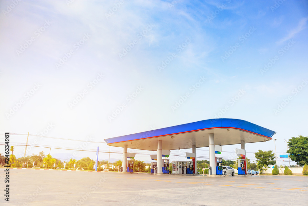 Petrol gas fuel station with clouds and blue sky