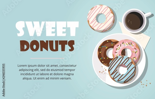 Donuts and cup of coffee on the blue background. Top view