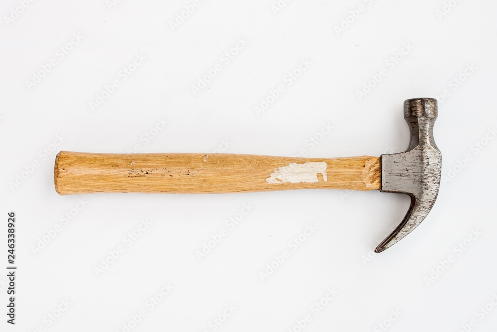 The vintage old hammer tool for the wood working job, Carpenter tool on the white background - vintage industrial tool concept image