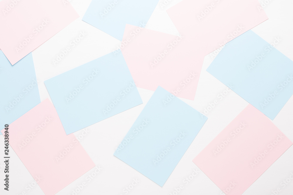 Abstract geometric background in light pastel tones from sheets of thick pale past paper. Abstract geometric background in light pastel tones from sheets of thick pale past paper.