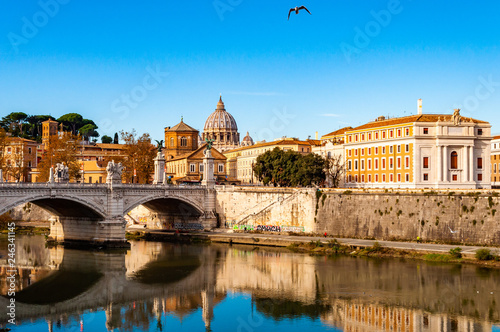 Photography Tiber river streams, Ponte Vittorio Emanuele II bridge, flying seagulls and Rome cityscape view with St
