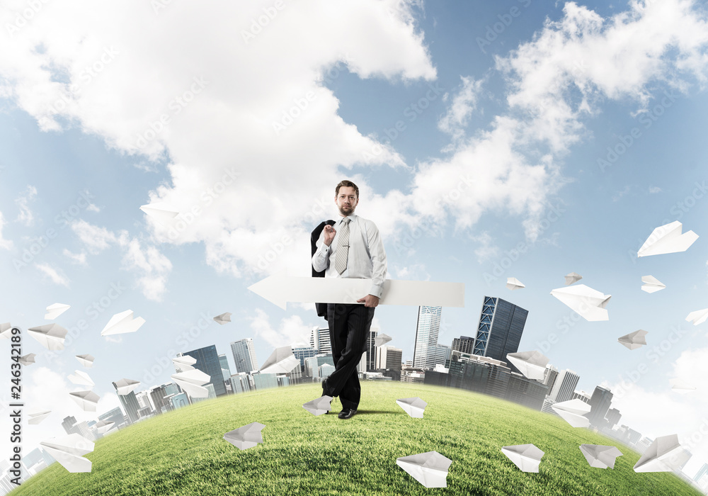 Conceptual image of businessman pointing aside Conceptual image of businessman pointing aside