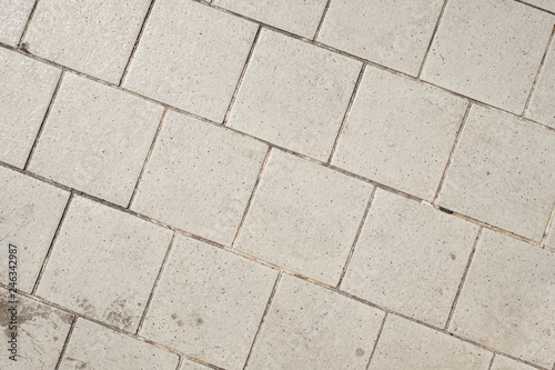 Old ceramic tile pavement texture background