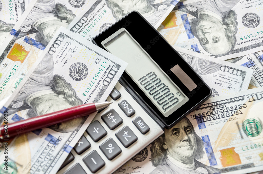 Fototapeta premium calculator, dollar and pen