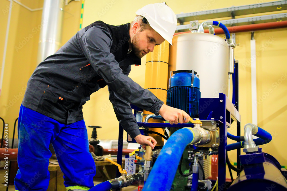 Technician worker on industrial factory