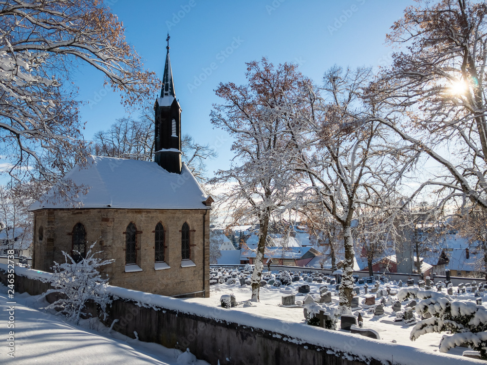 Graveyard chapel in the snow