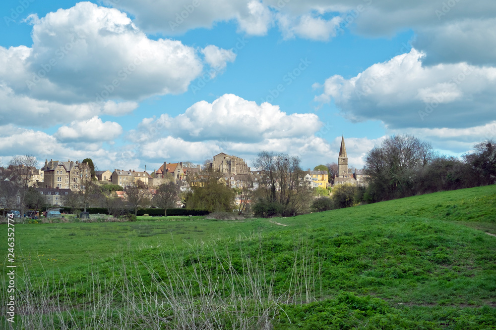 View of the historic town of Malmesbury and its picturesque Abbey Church on the hill, Malmesbury, Wiltshire, UK