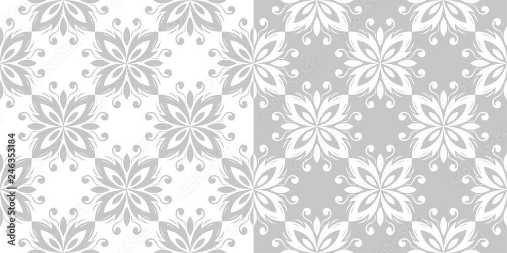 Floral seamless set of patterns. Gray and white backgrounds Floral seamless set of patterns. Gray and white backgrounds