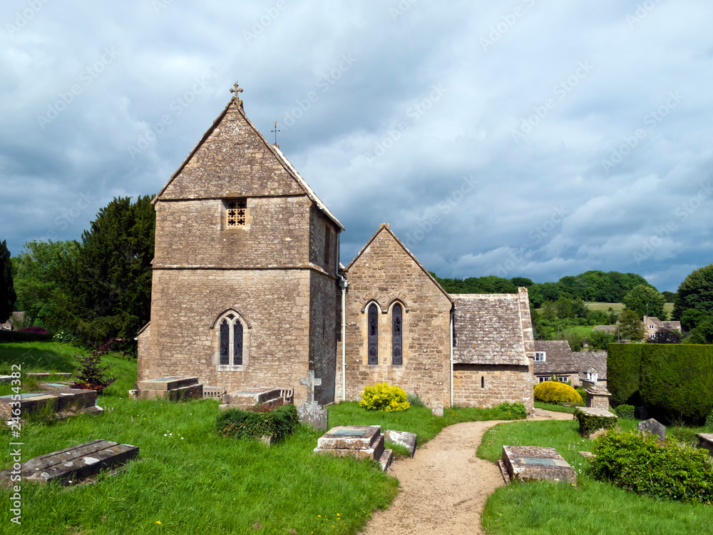 Picturesque old church in Duntisbourne Abbotts, an idyllic Cotswold village, Gloucestershire, UK