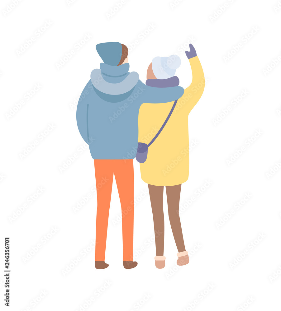 Standing back and embracing man and woman in warm blue hat and jacket with handbag and in colorful trousers and boots. Winter image isolated on white