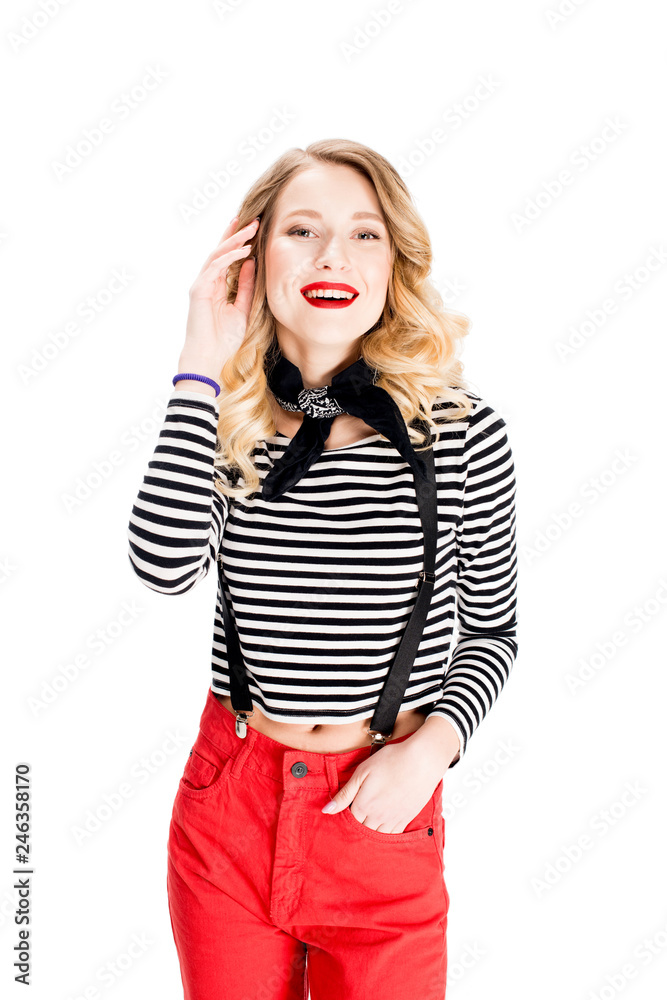 cheerful blonde woman smiling with hand in pocket isolated on white cheerful blonde woman smiling with hand in pocket isolated on white