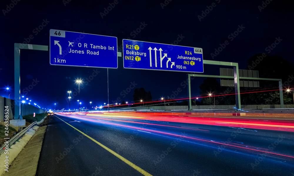 Obraz premium Motorway Signs on Highway at night