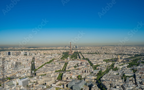 Morning aerial view of the famous Eiffel Tower and downtown citypscape