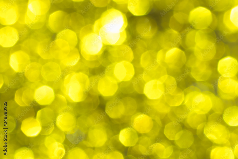 Golden glitter festive background with bokeh lights. Celebration concept for New Year, Christmas Holidays. Golden glitter festive background with bokeh lights. Celebration concept for New Year, Christmas Holidays.