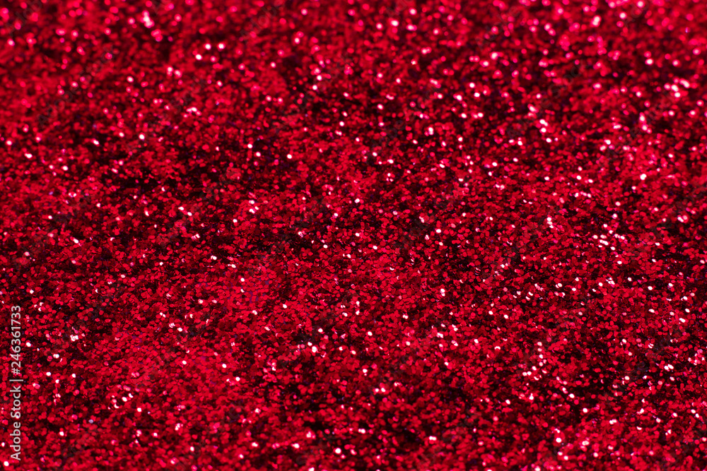 Red glitter texture. Festive sparkling sequins background closeup. Wpaper for Valentine, New Year or Christmas Holidays. Red glitter texture. Festive sparkling sequins background closeup. Wpaper for Valentine, New Year or Christmas Holidays.