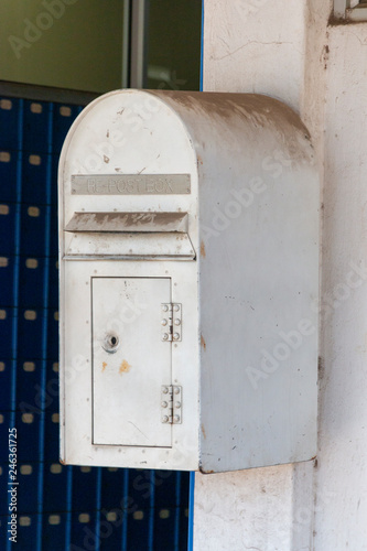 A Dirty White Post Box