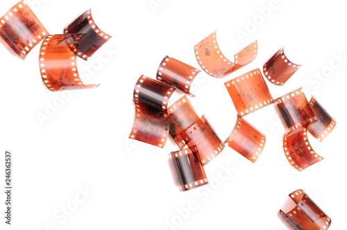 film negatives, film frames falling. on a white background
