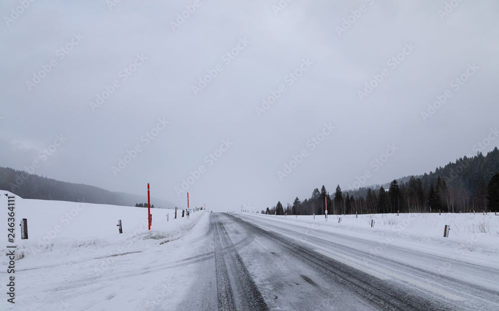 Snow. Cold. Landscape. Winter. Sky. Road. Hills