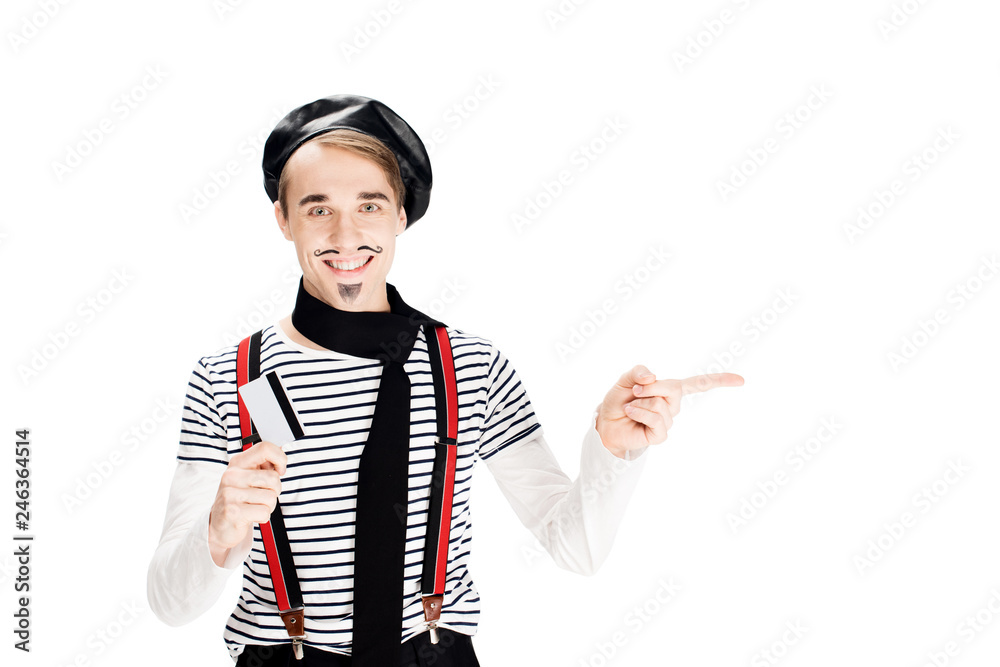 cheerful french man holding credit card and pointing with finger isolated on shite - obrazy, fototapety, plakaty 