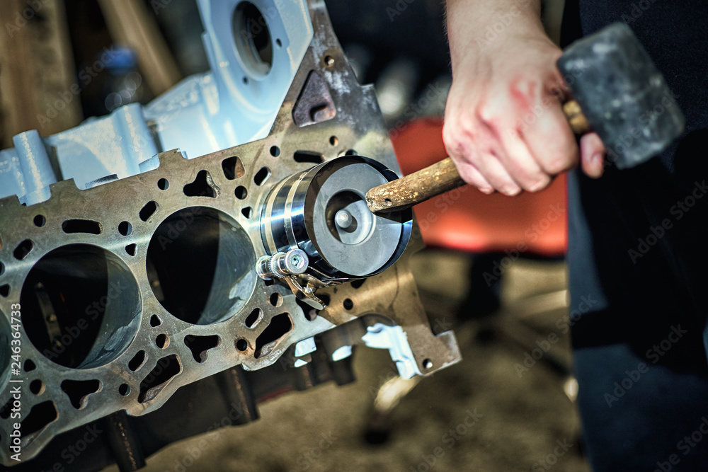 Automotive four-cylinder engine water cooling during repair. Automotive four-cylinder engine water cooling during repair.