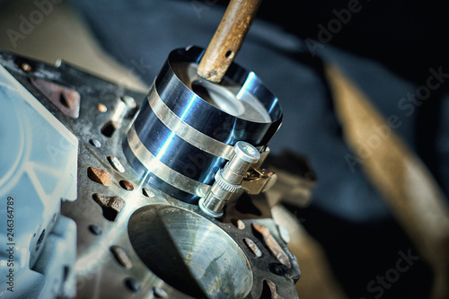 Automotive four-cylinder engine water cooling during repair. photo