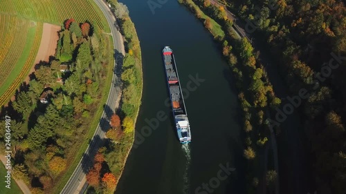 Aerial view of cargo vessel on Moselle River near Palzem, Obermosel, Rhineland-Palatinate, Germany (opposite side of river: Luxembourg) photo