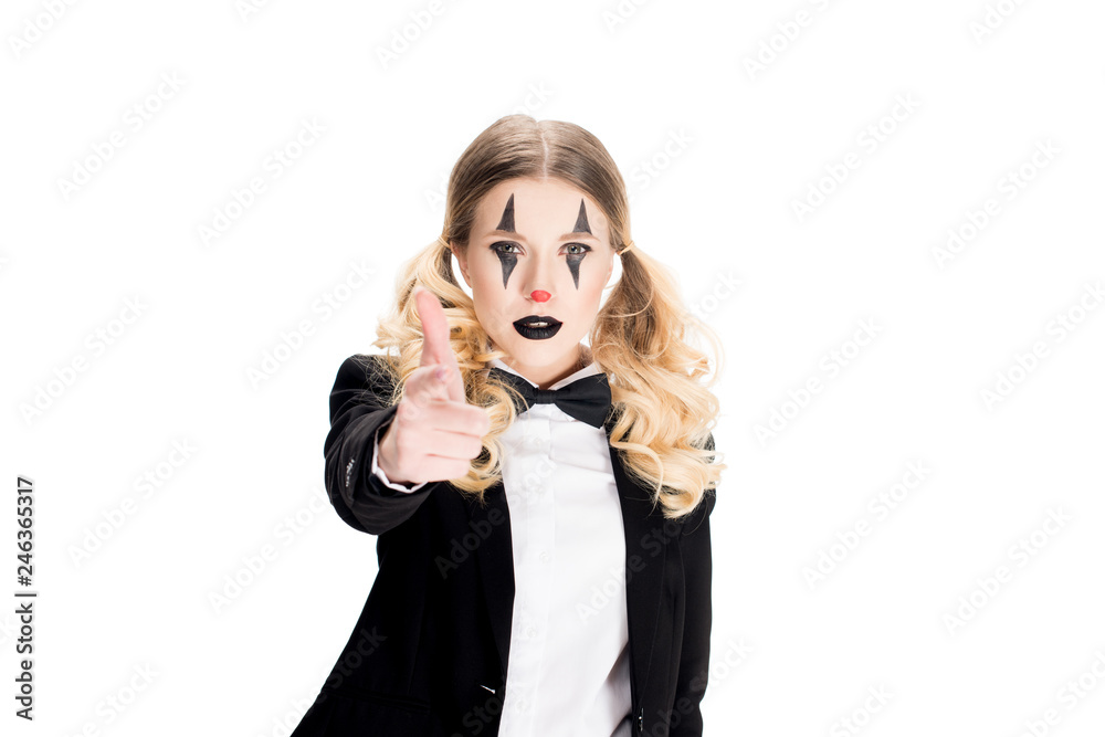 serious female clown in suit looking at camera and pointing with finger isolated on white serious female clown in suit looking at camera and pointing with finger isolated on white