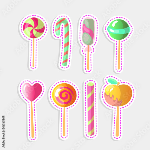 Set of bright vector candies. Set of colorful lollipops, cartoon illustration. Round and heart lollipop, caramelized apple, sweet candy cane isolated on white. Collection of sweet lollipops