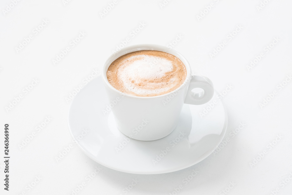 Coffee art minimalism. Single cappuccino cup on white background. Energy drink. Coffee art minimalism. Single cappuccino cup on white background. Energy drink.