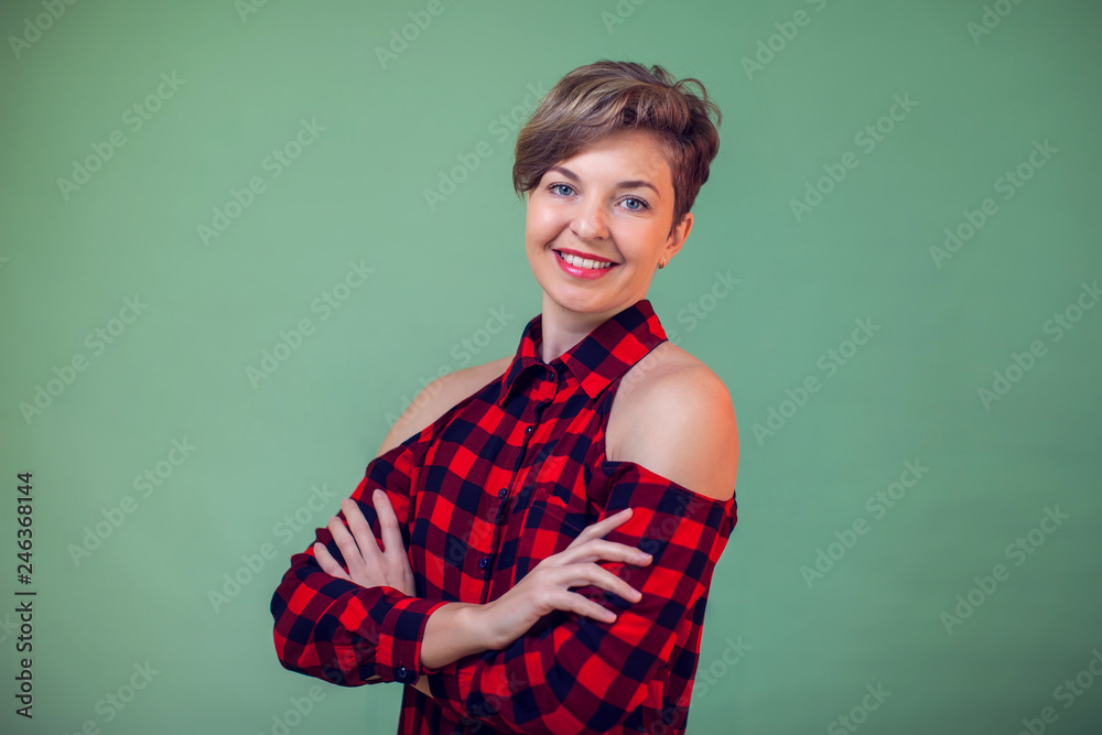 People and emotions - a portrait of smiling woman with short hair People and emotions - a portrait of smiling woman with short hair
