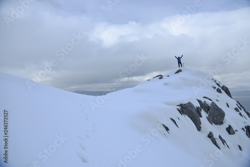 crazy lonely mountain climber and winter hiking adventure on the peaks of the Snowy Mountains