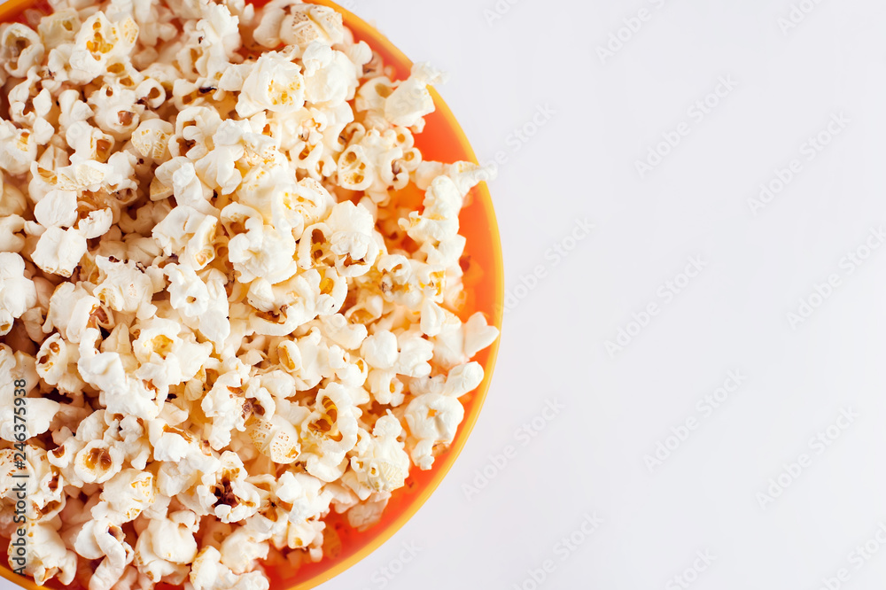 A bowl with popcorn isolated on white background. Food concept A bowl with popcorn isolated on white background. Food concept