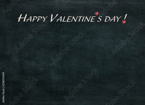 Happy Valentine's day written chalk on a blackboard