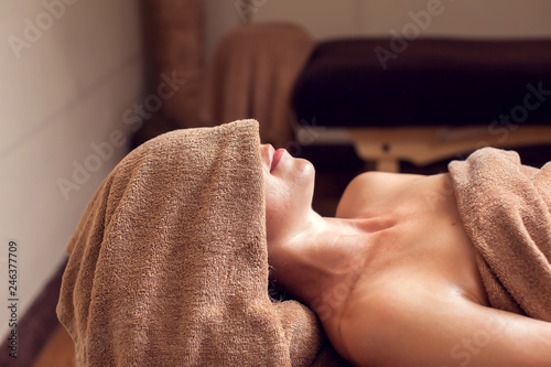 Beautiful young woman relaxing and enjoing her time in the spa salon-Spa  beauty  people and body care concept