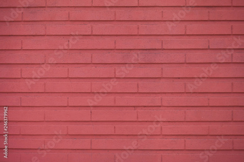 Pink brick wall background. Red wall texture