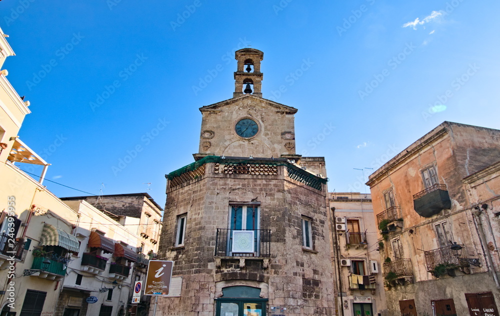 Old clock tower in the old town of Taranto, Puglia, Italy