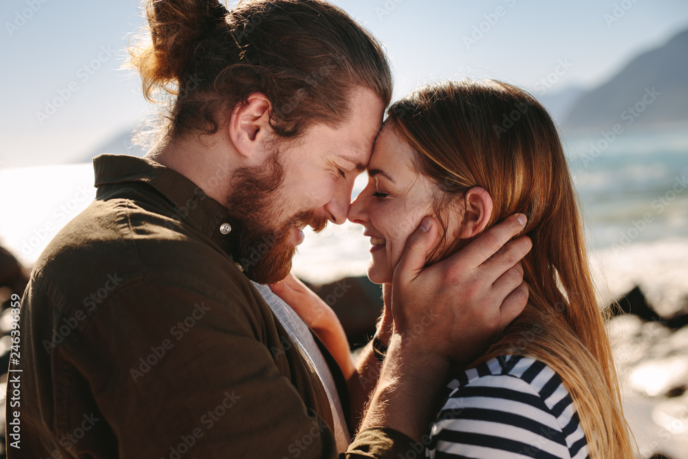 Romantic couple enjoying a day on the beach Romantic couple enjoying a day on the beach