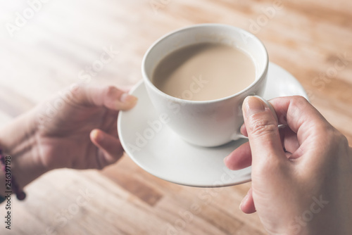 woman hold a cup a coffee