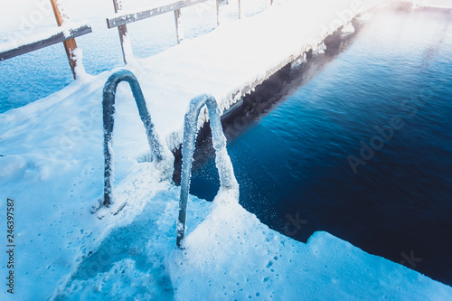 Very cold day at ice swimming place. Photo from Sotkamo, Finland.