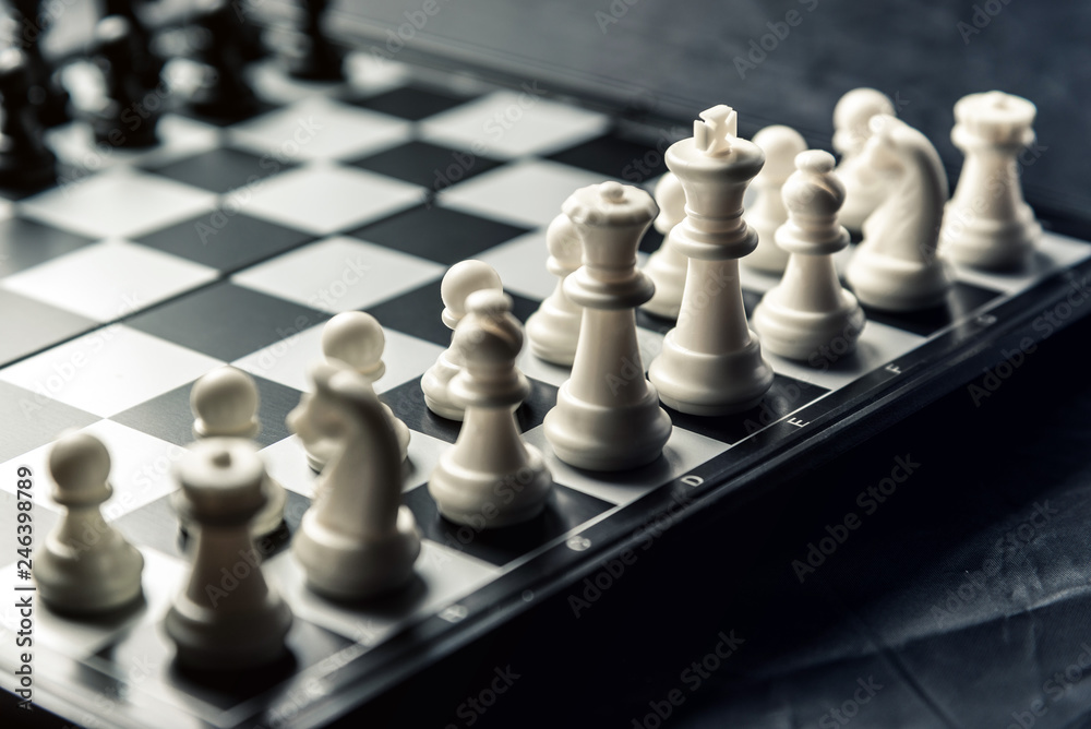 Chess board with black and white chess facing each other Chess board with black and white chess facing each other