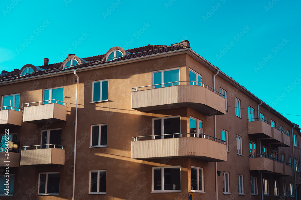 Obraz premium A apartment house. Corner of an apartment in the cold blue light of the sky.