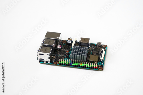 Small single-board computer with USB, Ethernet, HDMI, GPIO and radiator installed