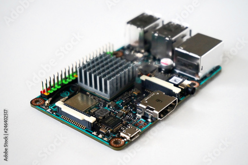 Small single-board computer with USB, Ethernet, HDMI, GPIO and radiator installed